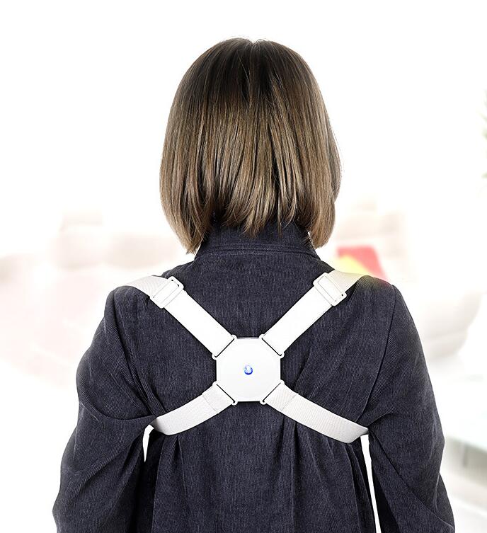 AlignX Pro posture corrector back view — discreet cross-back strap design